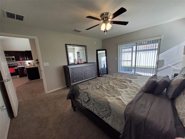 bedroom featuring access to exterior, visible vents, light carpet, and a textured ceiling