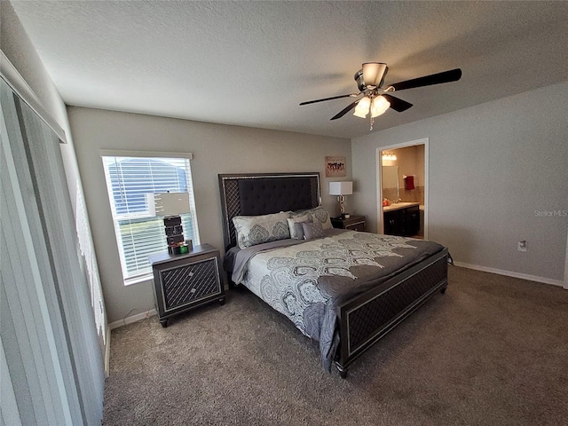 carpeted bedroom with connected bathroom, a textured ceiling, baseboards, and ceiling fan