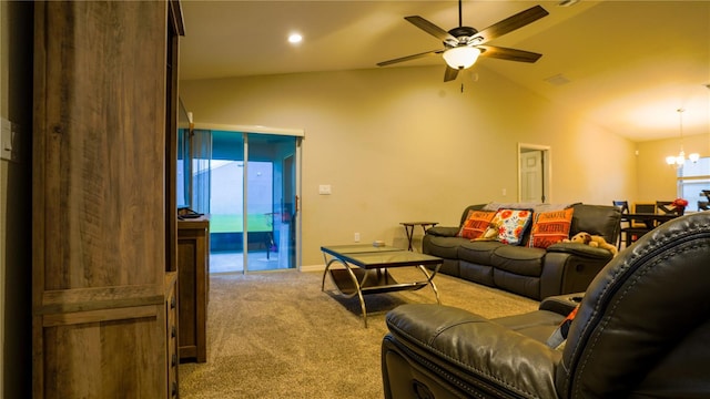 living room featuring light carpet, vaulted ceiling, and ceiling fan with notable chandelier