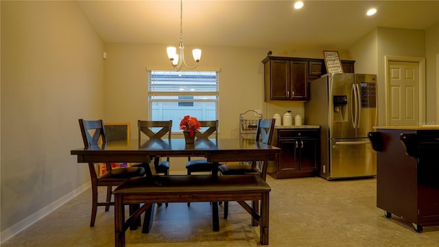 dining space with a chandelier, recessed lighting, and baseboards