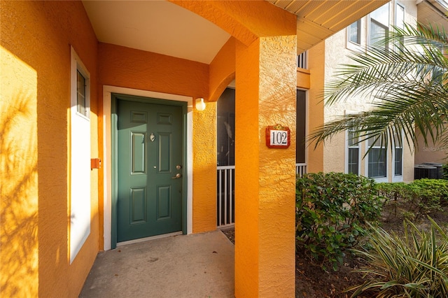 property entrance with central air condition unit