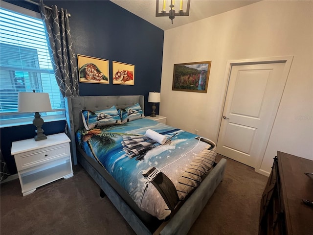 bedroom featuring dark colored carpet