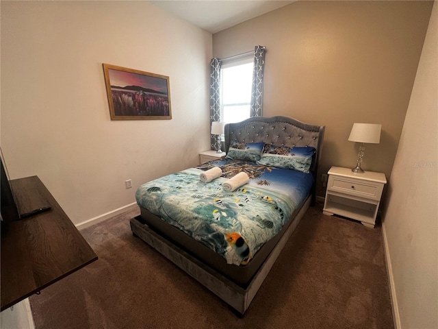 bedroom with dark carpet