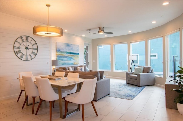 dining room with ceiling fan and light tile patterned floors