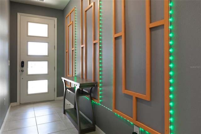 tiled entrance foyer featuring a wealth of natural light