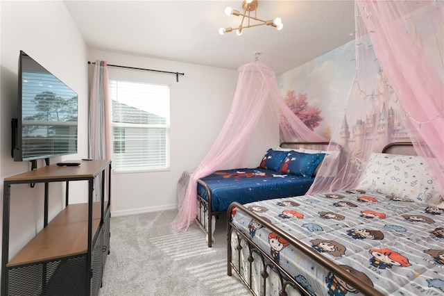 bedroom with an inviting chandelier and light colored carpet