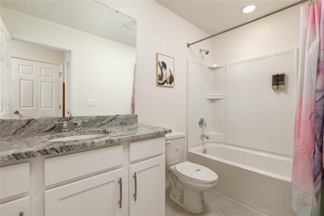 full bathroom with shower / bath combination with curtain, vanity, tile patterned floors, and toilet