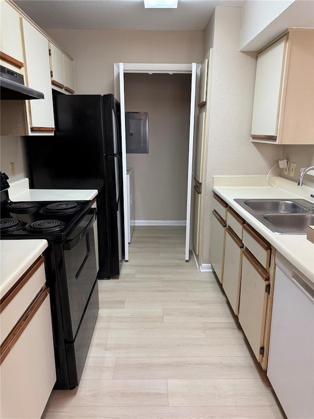 5635 Devonbriar Way Unit 103, Orlando, FL 32822 - kitchen featuring a sink, light countertops, under cabinet range hood, dishwasher, and black / electric stove