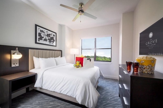 carpeted bedroom featuring ceiling fan