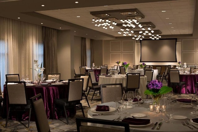 dining space featuring a paneled ceiling