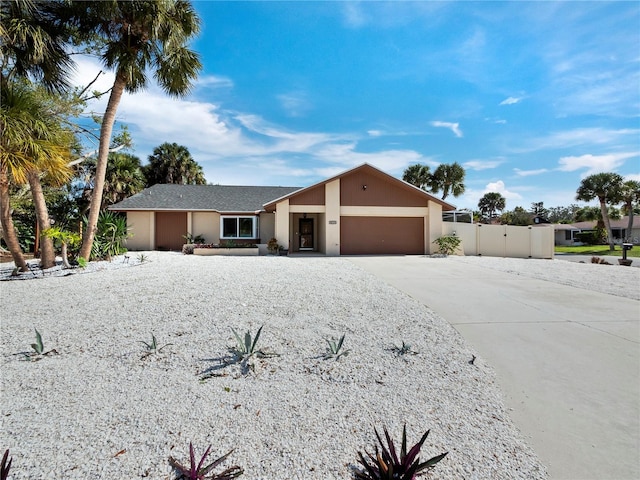 ranch-style home with a garage