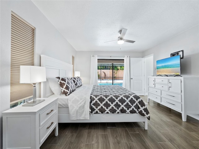 bedroom with access to outside, a textured ceiling, and ceiling fan