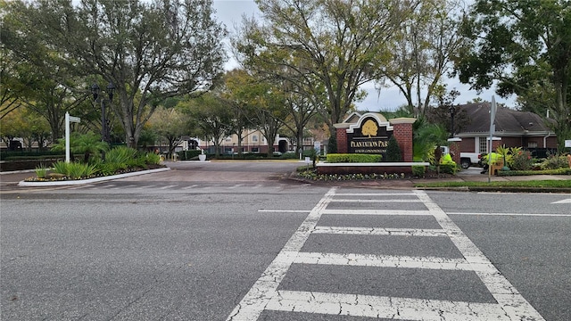 view of road with curbs