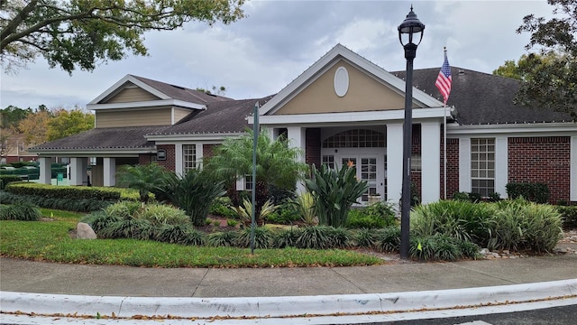 view of front of home with brick siding