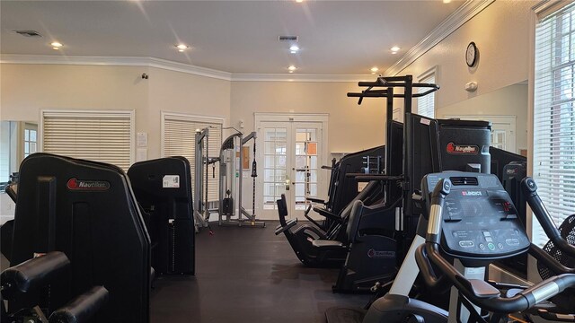 exercise room featuring crown molding and french doors