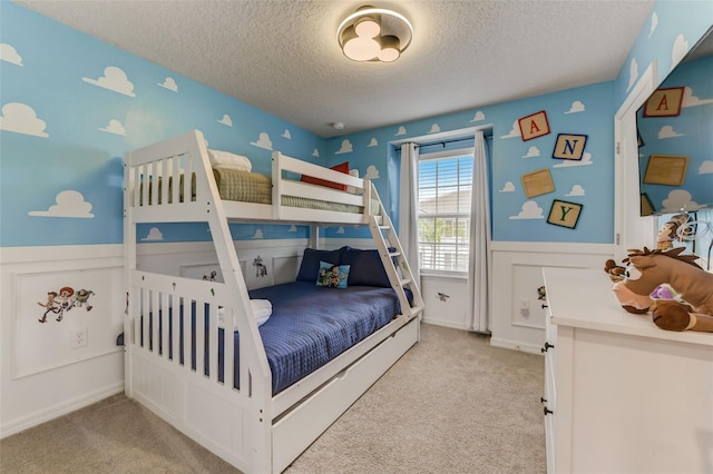 carpeted bedroom with a textured ceiling