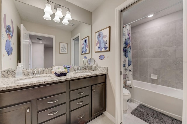 full bathroom with double sink vanity, tile flooring, shower / tub combo with curtain, and toilet