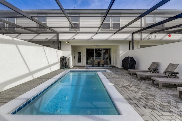 view of swimming pool featuring a patio area