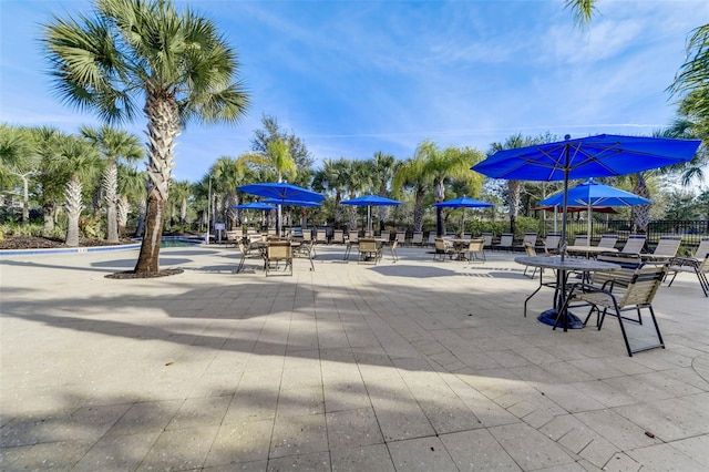 view of home's community with a patio area