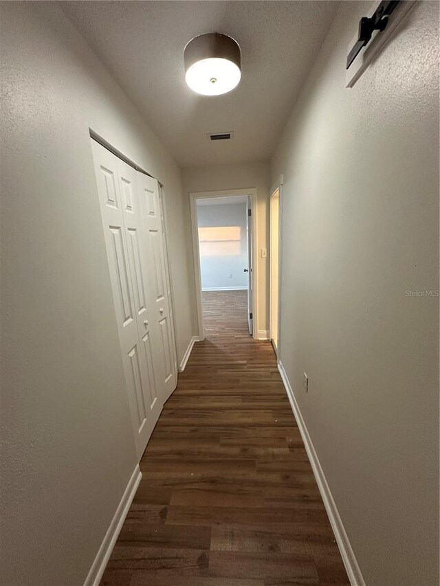 hall featuring dark hardwood / wood-style floors