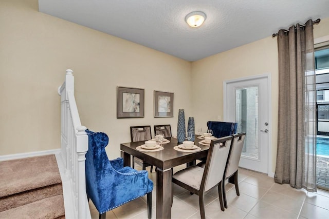 dining room with light tile floors