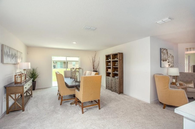 view of carpeted dining room