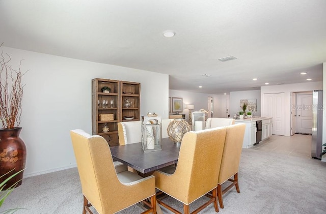 view of carpeted dining room