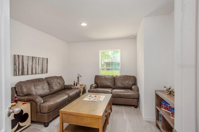 living room featuring light colored carpet