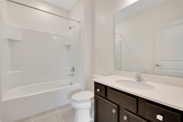 full bathroom with shower / washtub combination, toilet, vanity with extensive cabinet space, and tile flooring