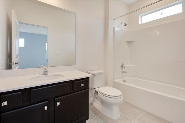 full bathroom featuring tile floors, toilet, vanity, and washtub / shower combination