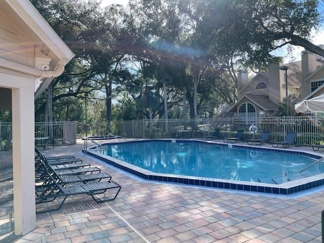 view of pool featuring a patio