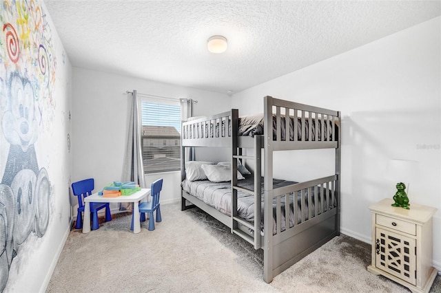 carpeted bedroom with a textured ceiling