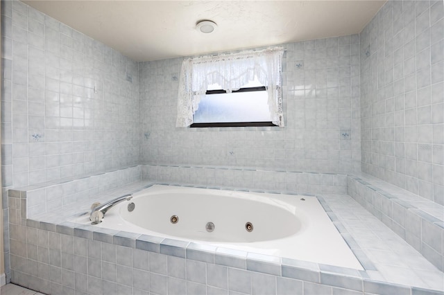 bathroom with tiled tub