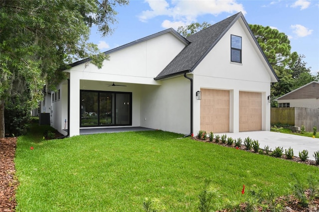 exterior space with a front yard and a garage