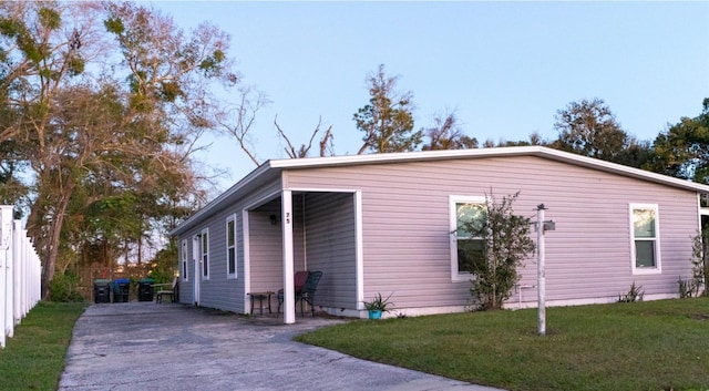 view of property exterior featuring a yard