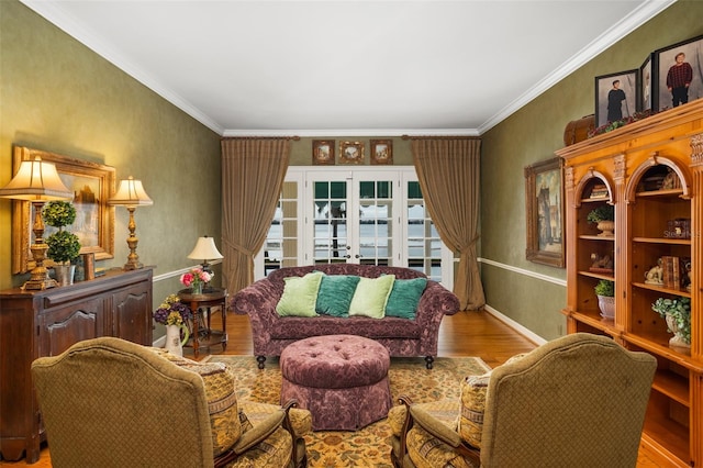 living room with crown molding, french doors, and wood-type flooring