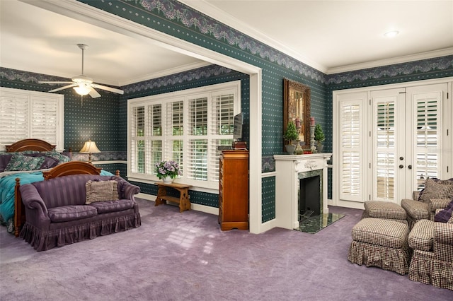 interior space with plenty of natural light, dark carpet, ceiling fan, and a premium fireplace