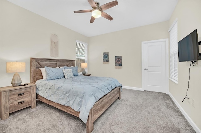 bedroom with light colored carpet and ceiling fan