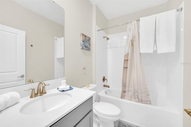 full bathroom with shower / tub combo, vanity, and toilet