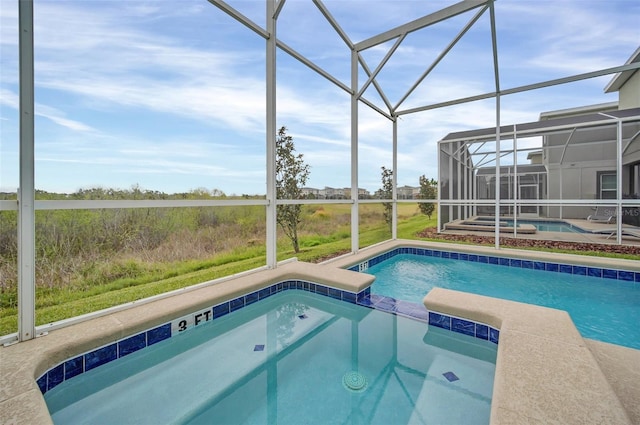 view of pool with a lanai