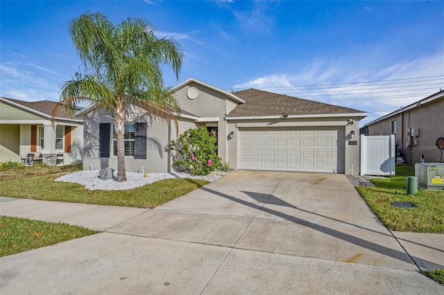 ranch-style house featuring a garage