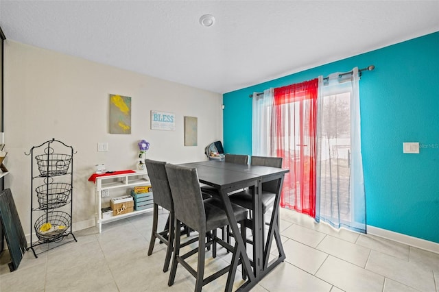 view of tiled dining area