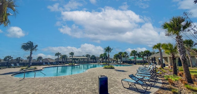 view of swimming pool featuring a patio