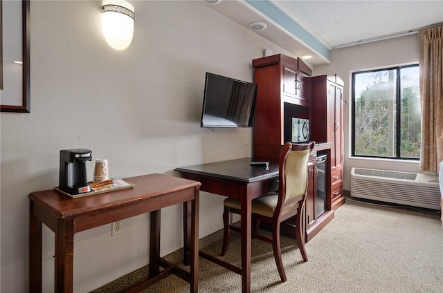 home office featuring light carpet, radiator heating unit, and ornamental molding