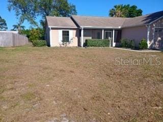 6425 Stillwater Ave, Cocoa, FL 32927 - view of front of house featuring a front yard