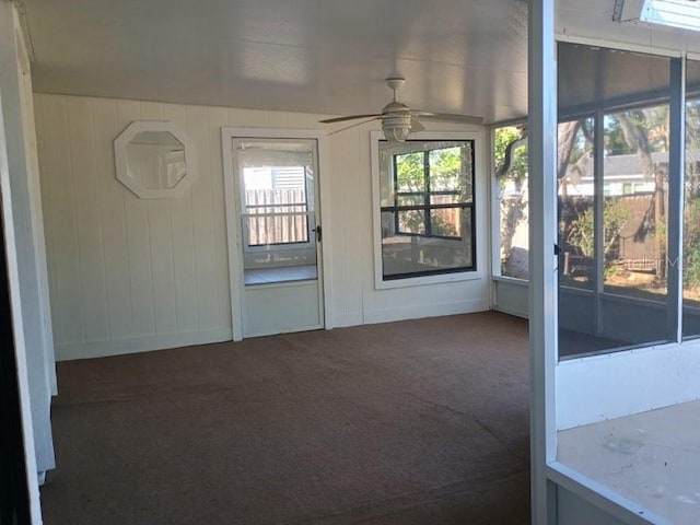 6425 Stillwater Ave, Cocoa, FL 32927 - unfurnished sunroom featuring a ceiling fan