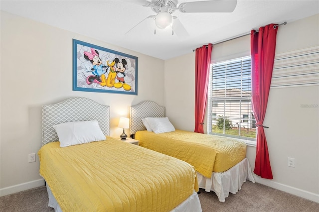 bedroom featuring ceiling fan and carpet floors