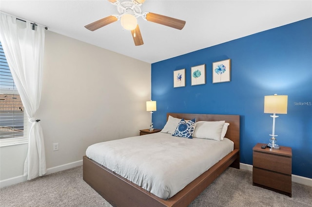 bedroom with ceiling fan and carpet