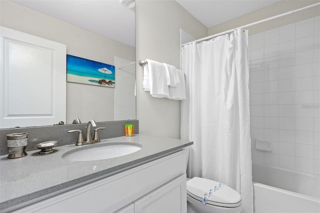 full bathroom with toilet, shower / bath combo with shower curtain, and vanity with extensive cabinet space