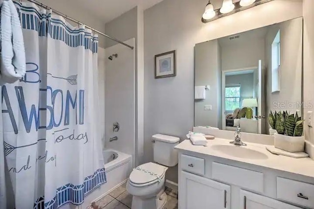 full bathroom with shower / bath combination with curtain, tile flooring, oversized vanity, and toilet